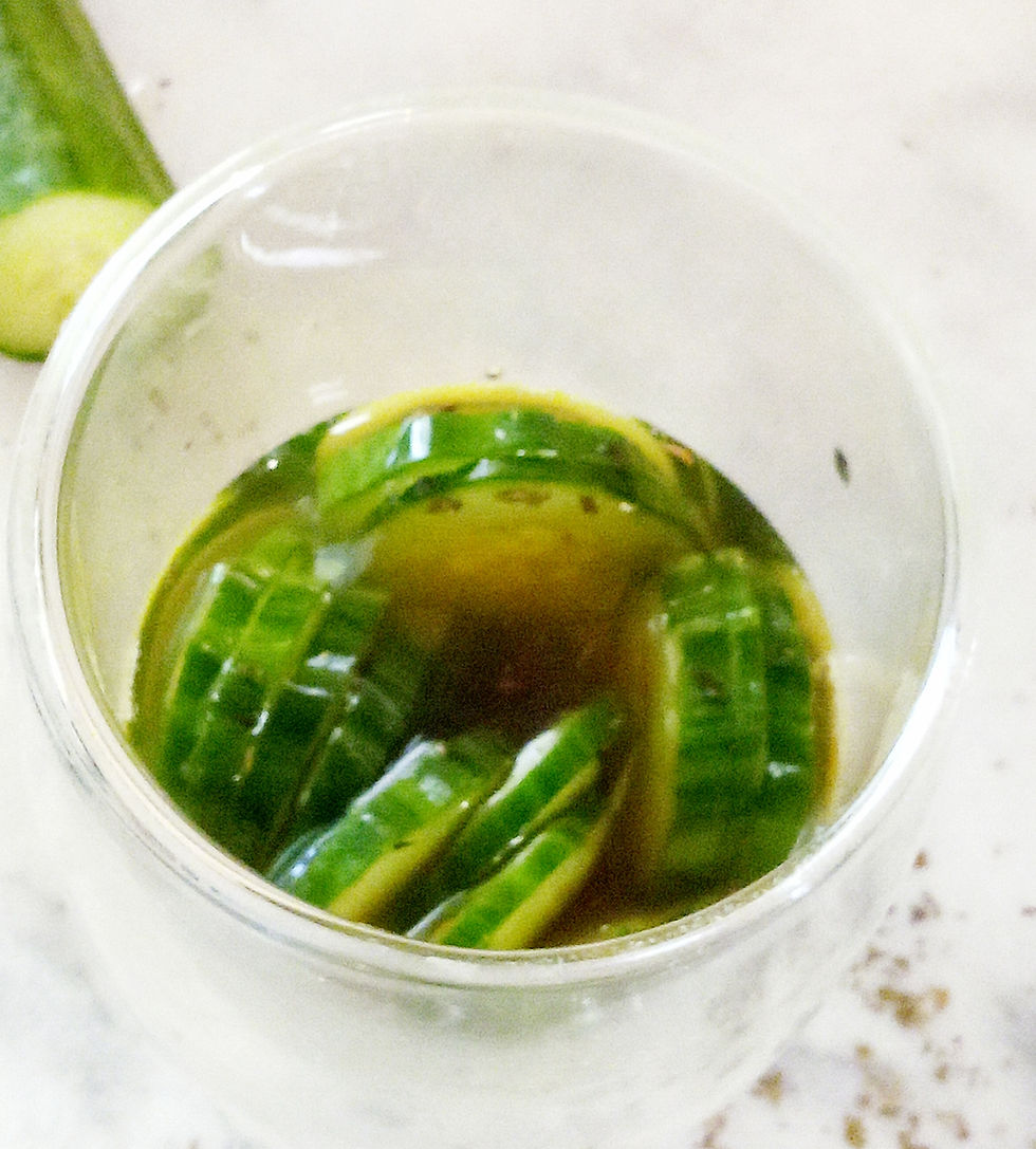 Add in cucumber slices to the cooled mixture