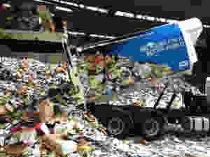 Recycling truck being emptied