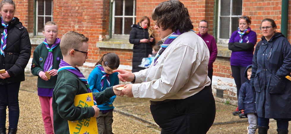 Milton is awarded his badges