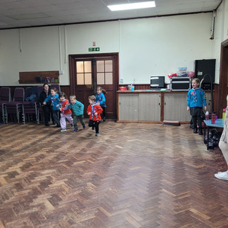 Squirrels and Beavers run across their meeting hall