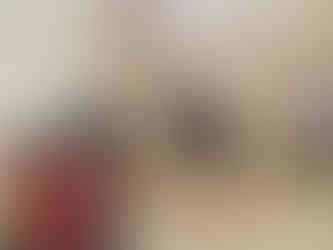 Squirrel and Beaver Scouts stand in an empty room, looking excited with their hands over their ears. One Beaver Scout is crouched. The floor is plain wood and the walls and peeling limewash