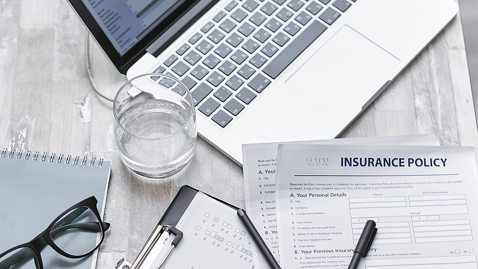 Business insurance policy on the table - review the wording