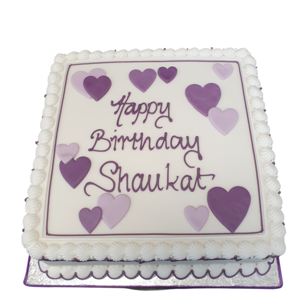 Bespoke 12-square cake decorated with red hearts, perfect for celebration in Solihull, West Midlands.