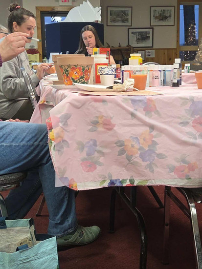 Painting flower pots.