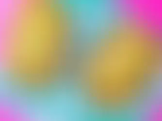 2 hot dogs on a green checked paper, with mustard.