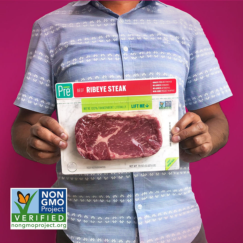 A person holding a package of Pre beef