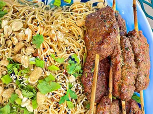 Beef kofta skewers served with a Thai noodle salad and peanut dipping sauce