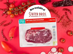 A package of ribeye beef with the Stater Bros. logo above it and veggies around it in the circle