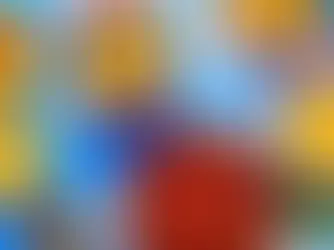 An overhead view of a pot of chili with frito chips and fixings all around