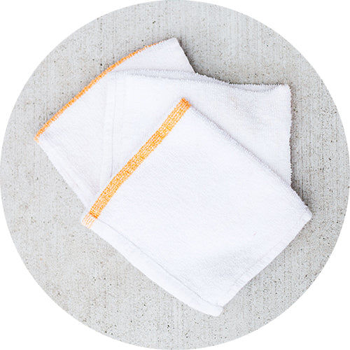 Two towels on cement