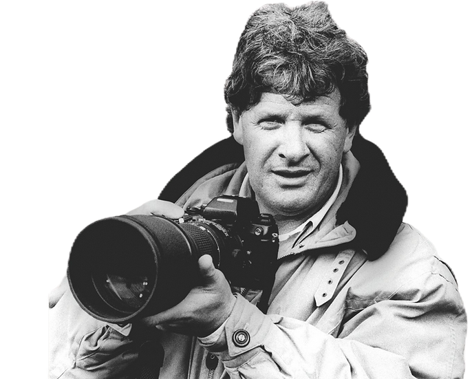 Willibrord Frequin met foto camera