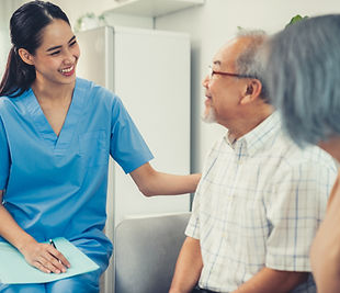 nurse with family having conversation