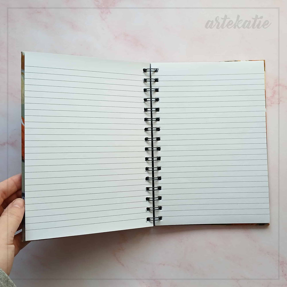 Open lined notebook with spiral binding