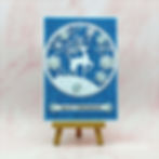 deer in a snowglobe on sparkling blue bg handmade card img