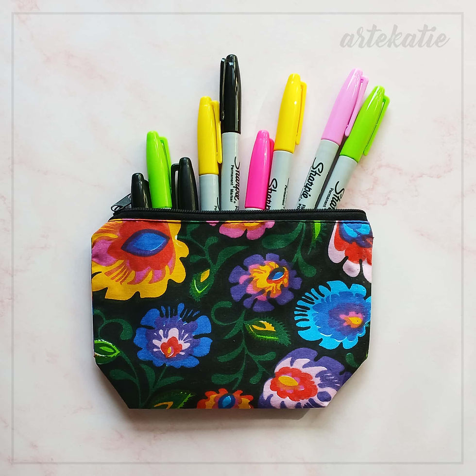 Colorful pens in floral pencil case, example of use