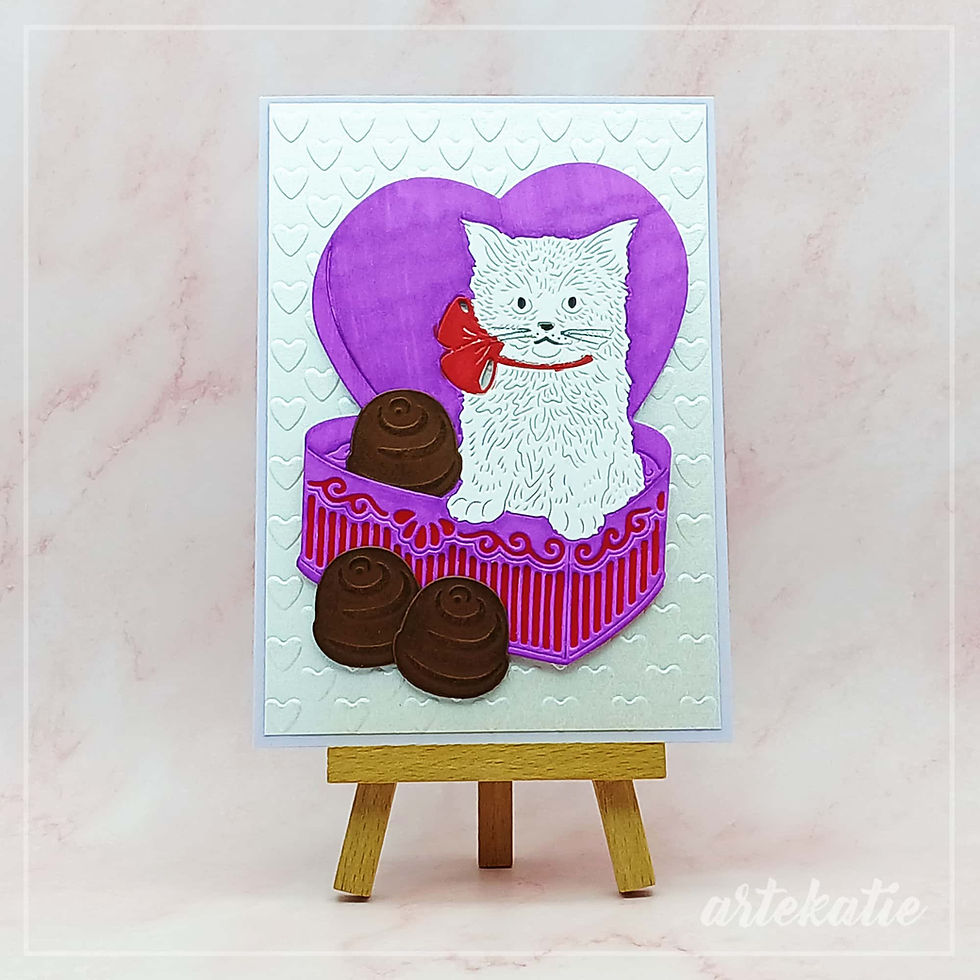 Handmade card kitten in a purple box of chocolates