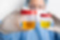 lab-doctor-performing-medical-exam-urine.jpg
