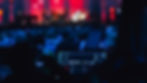 Video operator mixing content live during a backstage AV rehearsal