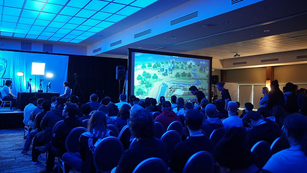 Video Game Competition Event with Audience and Projector