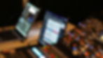 Laptops showing slide control and video playback during tech prep