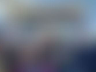 Outdoor event with LED video wall on stage at a festival, showing live production setup and crowd viewing large screen display