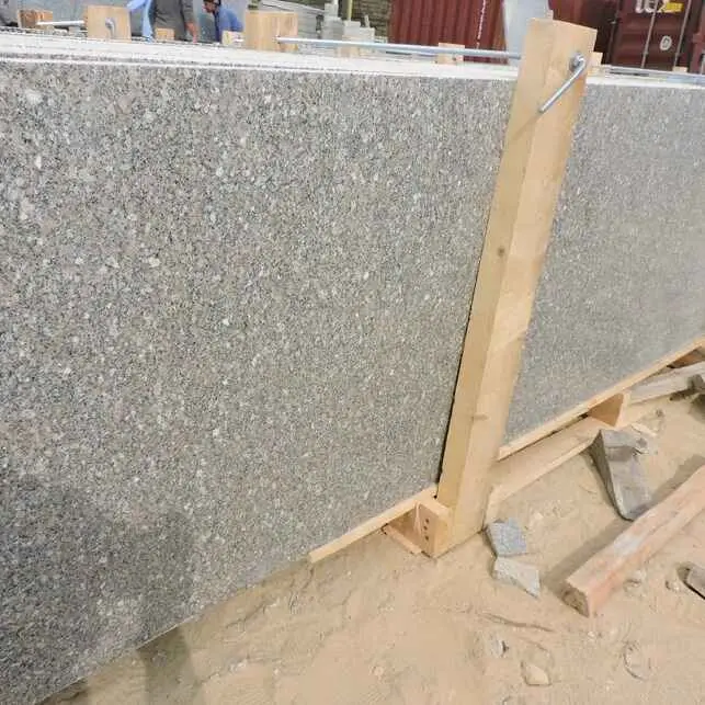 "Granite slabs in fumigated wooden crates with iron strips to prevent shifting in transit."
