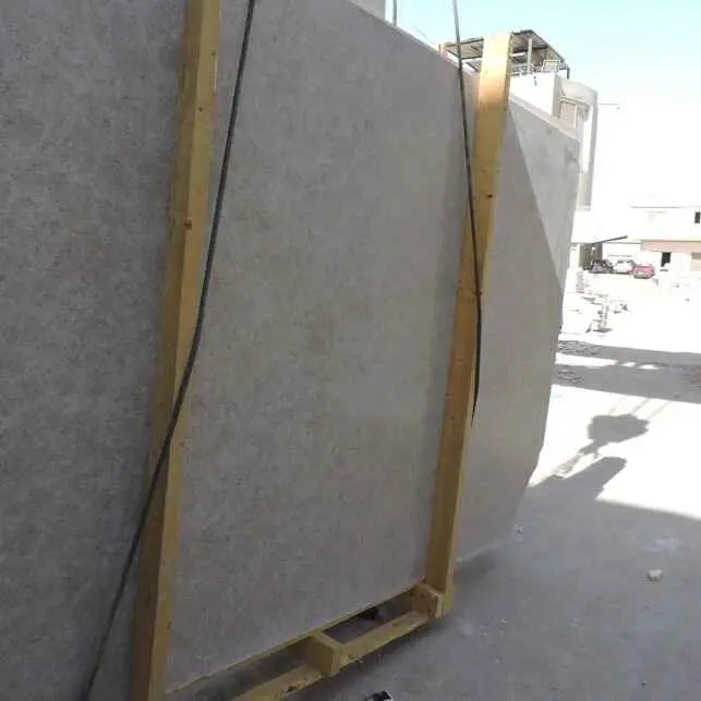 limestone slabs stacked in wooden crates with dimensions and material labels clearly marked."

