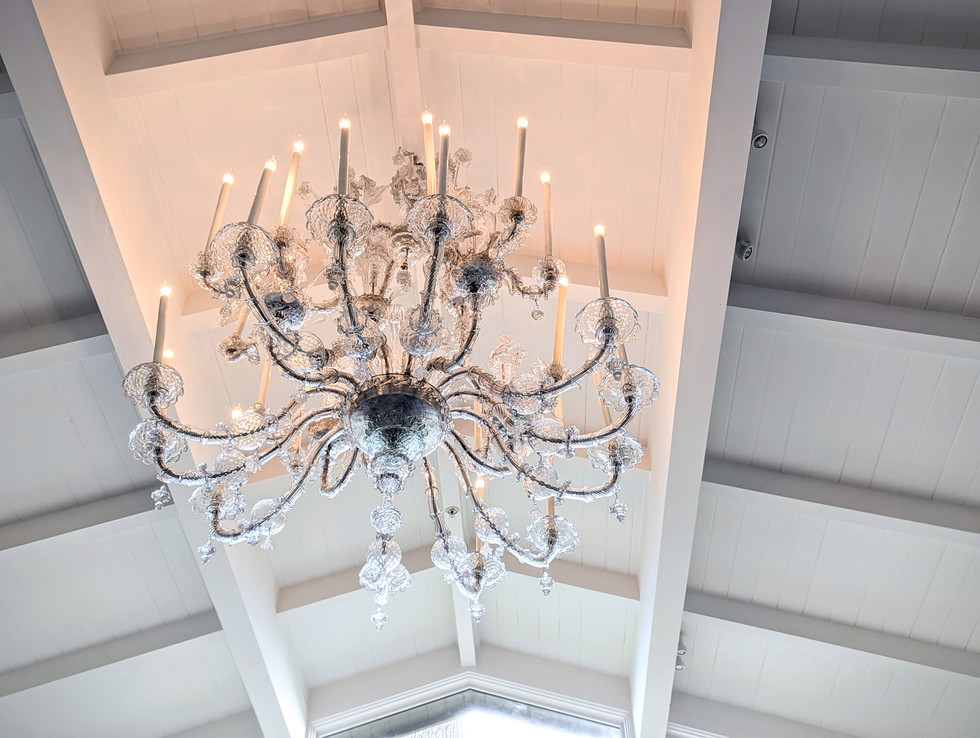 The Lyles-Ford chandelier , lit. Photographed from below.