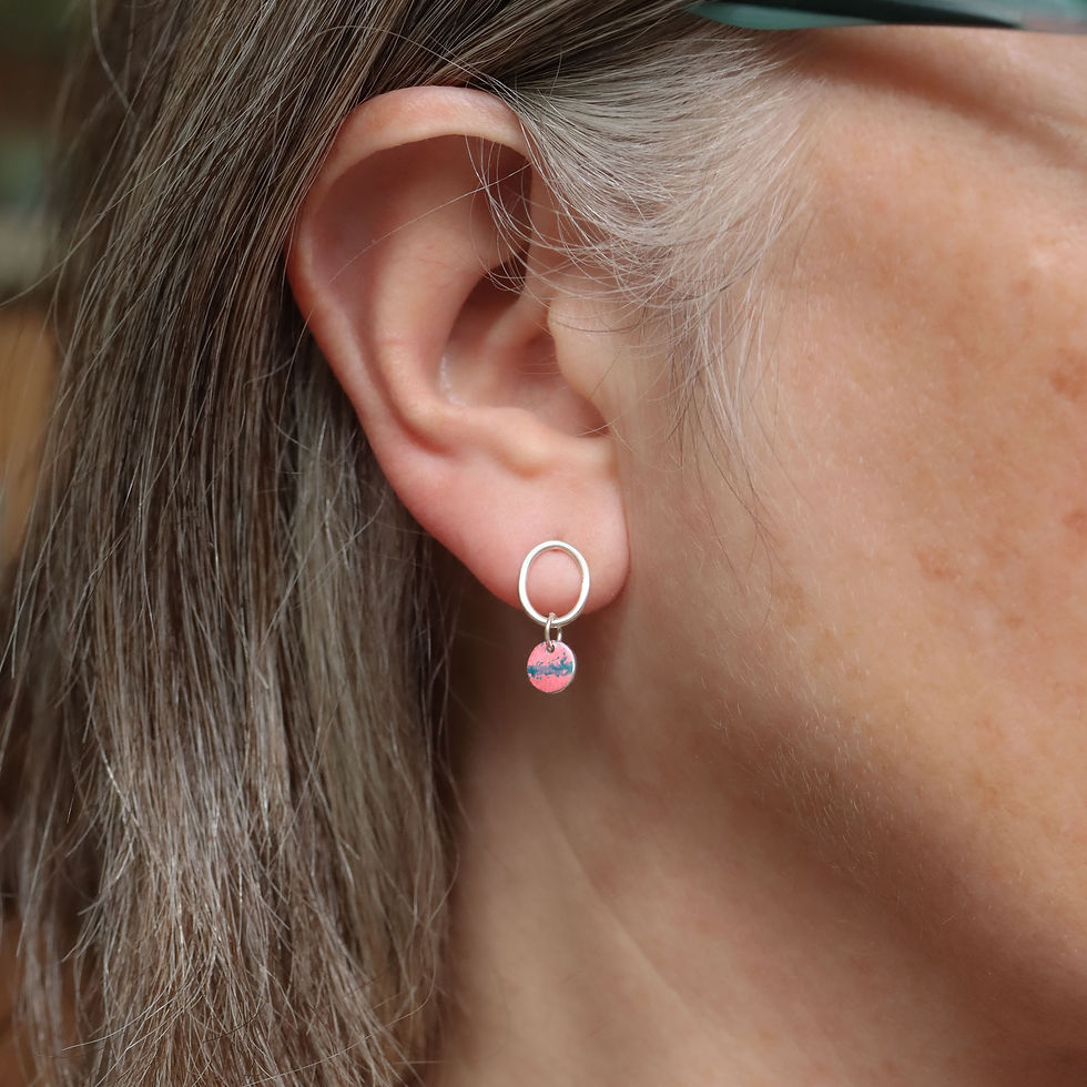 Thumbnail: Pink and blue aluminium mini drop silver oval stud earrings on a white woman