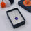 Thumbnail: Royal blue sea glass cabochon silver cute necklace in a jewellery box