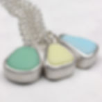 Thumbnail: Pastel lmilk sea glass silver pendant necklaces on a white background