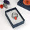 Thumbnail: Five silver sea glass and silver movement ring in orange in an open jewellery box