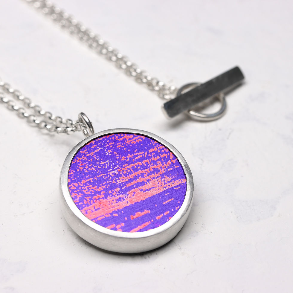 Thumbnail: Purple and pink aluminium and silver pendant necklace on a white background