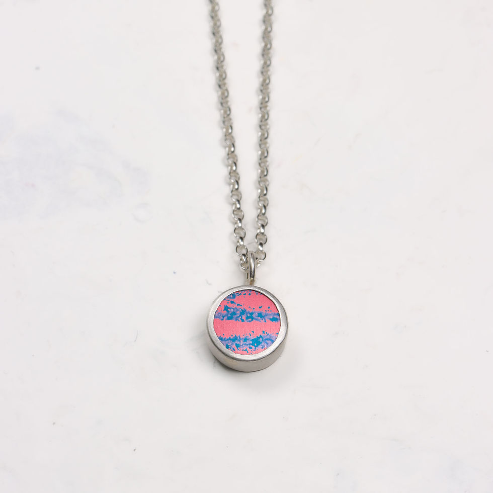 Thumbnail: Pink and blue anodised aluminium and silver pendant necklace on a white background