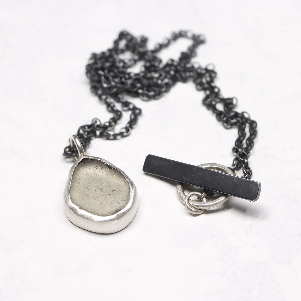 Thumbnail: Grey sea glass and silver necklace on black oxidised chain on a white background