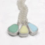 Thumbnail: Pastel milk sea glass silver pendant necklaces on a white background