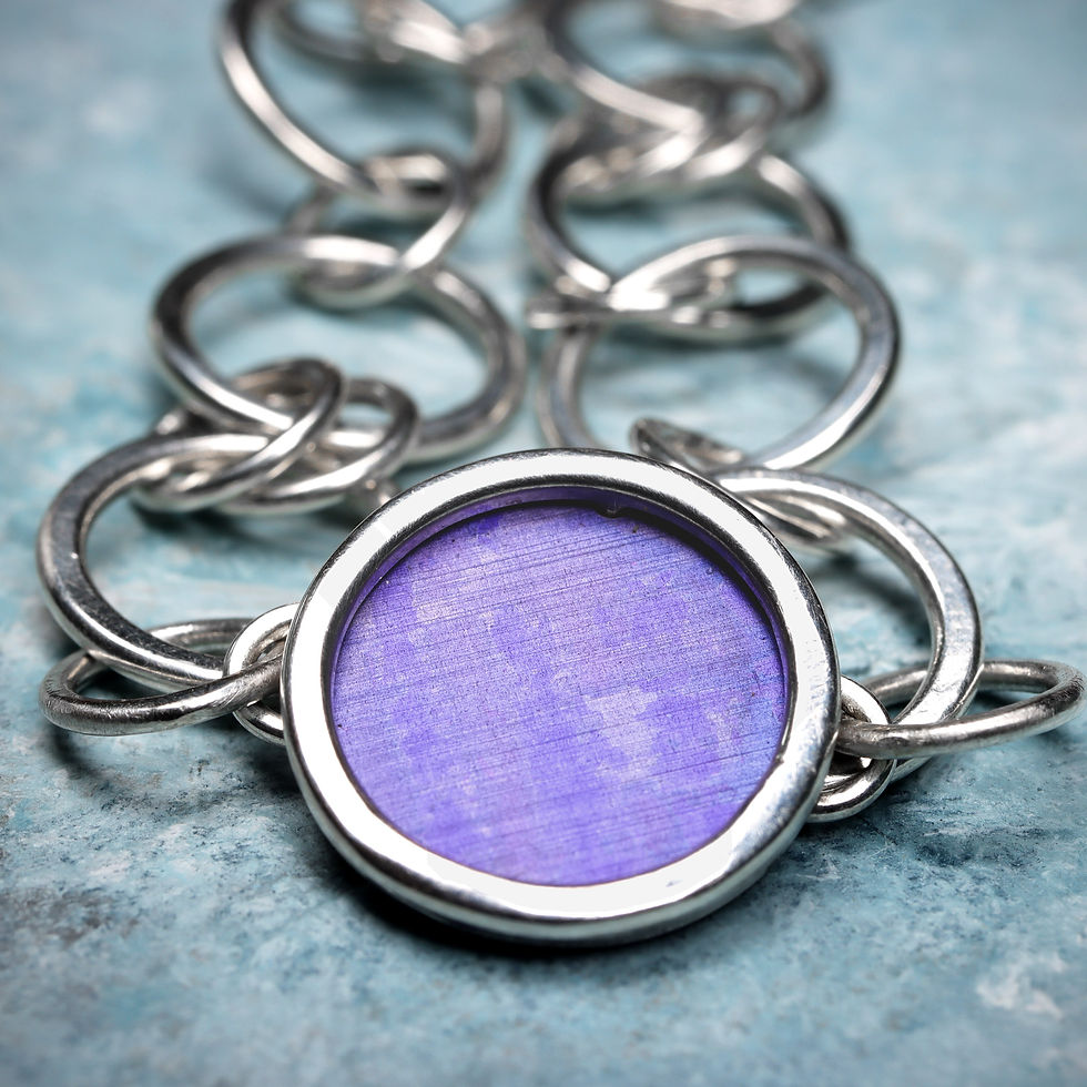 Thumbnail: Lavender blue and purple silver chain bracelet on a blue background
