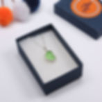 Thumbnail: Spring green sea glass and silver minimalist pendant necklace on a white background in a jewellery box