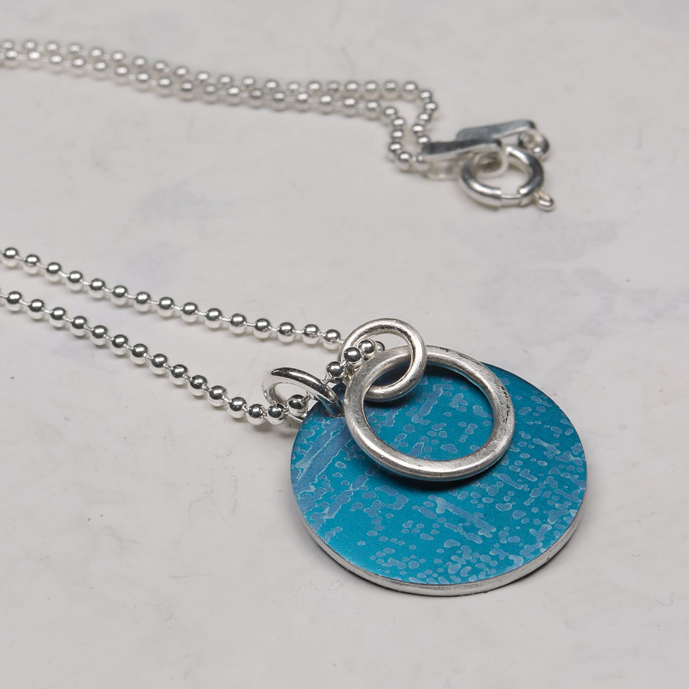 Thumbnail: Blue and purple and silver disc duo cluster necklace on a white background