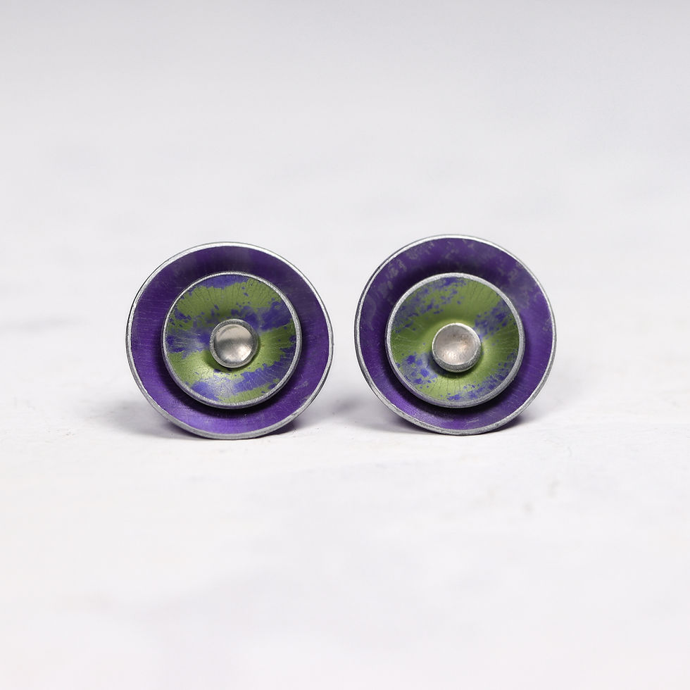 Thumbnail: Three layer silver stud earrings in purple and lime green on white background