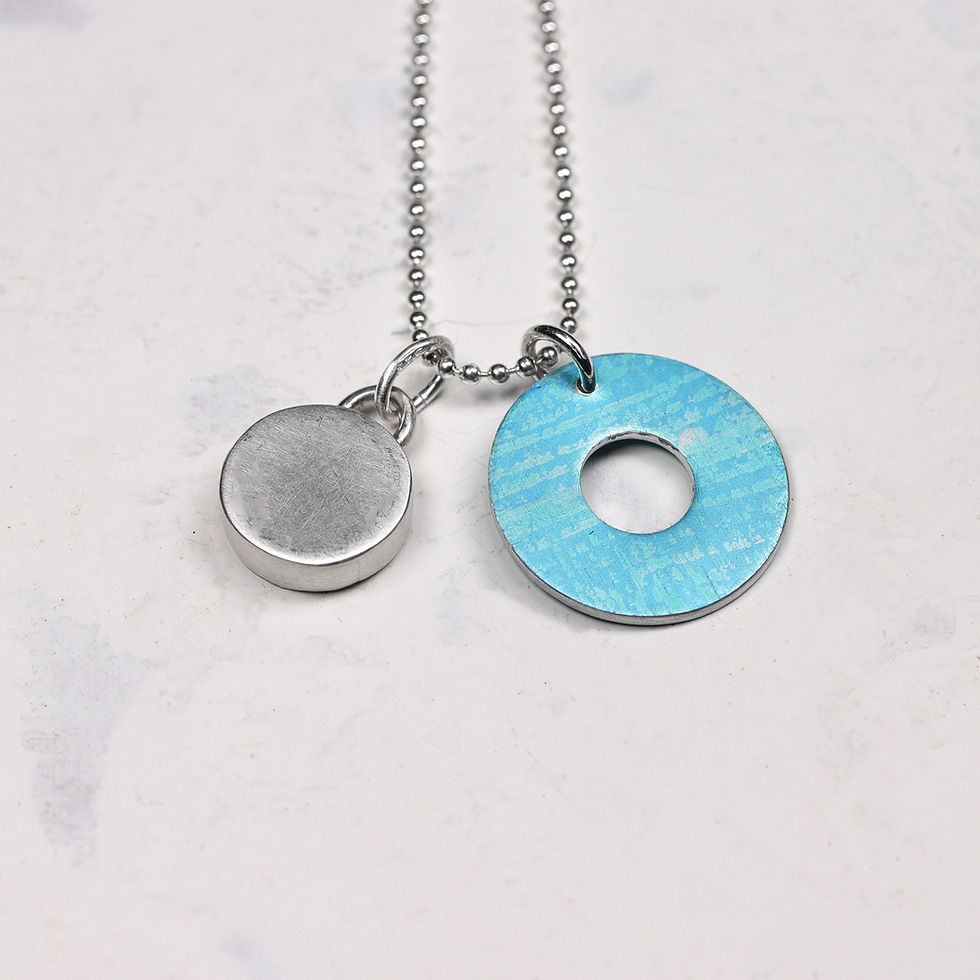 Thumbnail: Back view of silver and turquoise necklace on white background