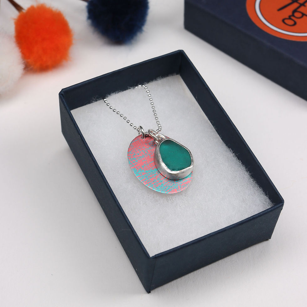 Thumbnail: Pink and teal green sea glass silver 3 in 1 cluster necklace in a jewellery box on a white background