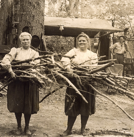 Ladies with sticks.png