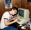 davinci_a_computer_nerd_working_on_an_apple_ii_computer.png