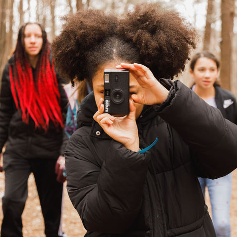 Girl holding a camera