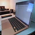 Laptop- Studio services placard (1).png