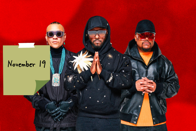 Three people stand in a row against a red background, wearing stylish black outfits. A note reads "November 19." They look serious.