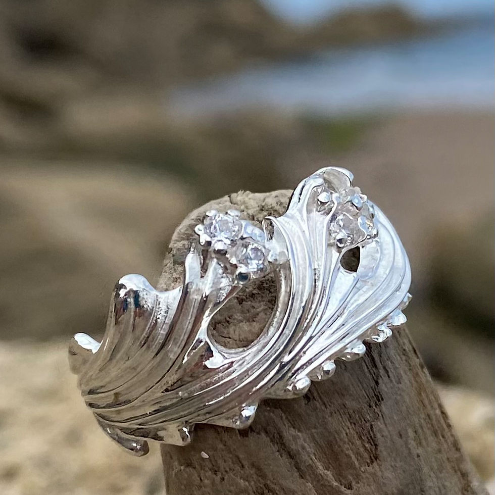 Thumbnail: Silver wave ring with bright cubic Zirconia gem stones