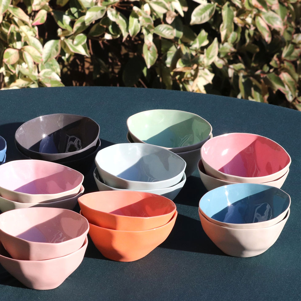 Thumbnail: Different bright colour ceramic rice bowls sit on a table