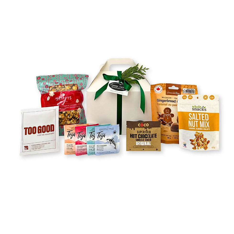 Cozy Christmas Gift Box with chocolates, drinks, nuts and a candle.